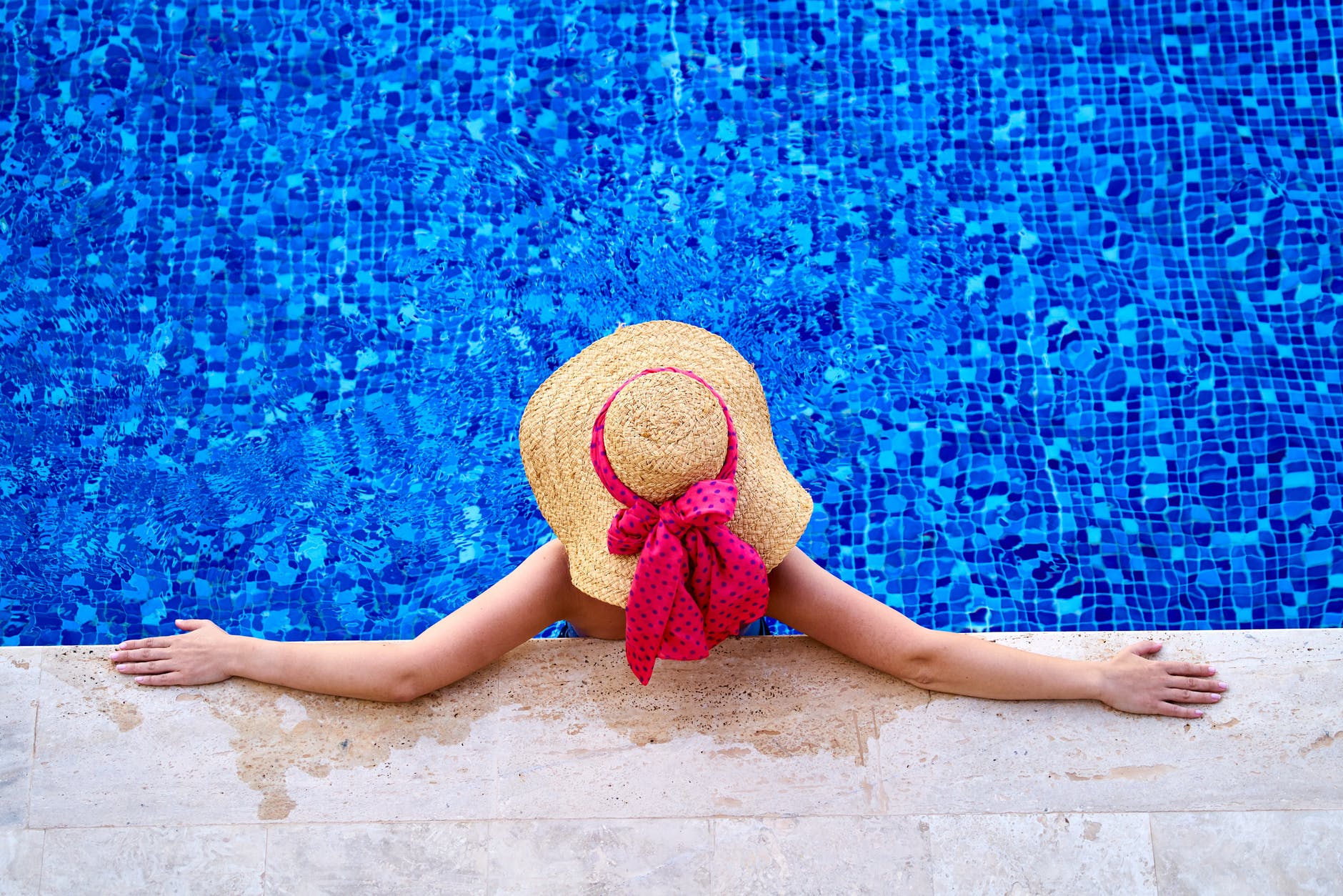 high angle photo of person wearing sun hat