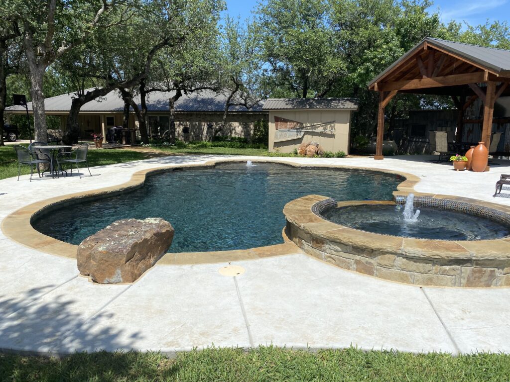 In Ground Freeform Pool with Spa with diving rock